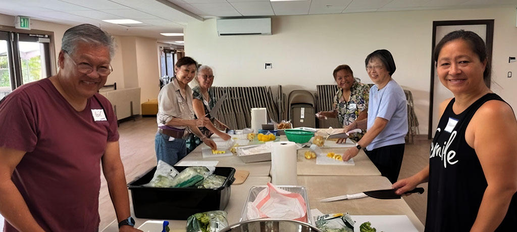 Chef Charisse and volunteers prepare ingredients for the plant-based Hikari Bentos